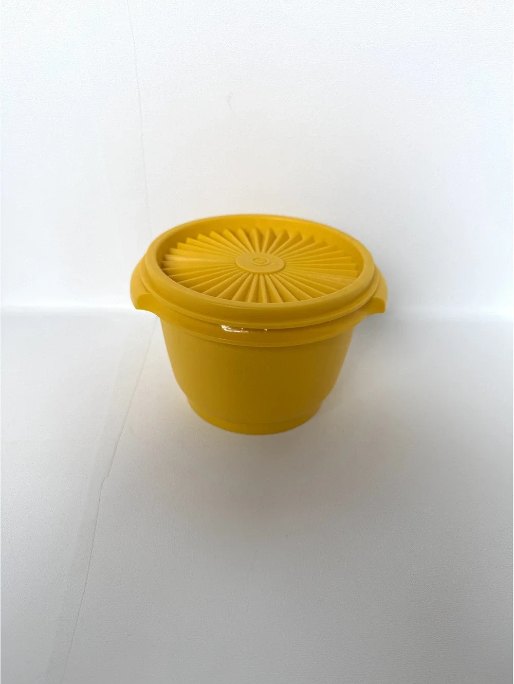 Vintage Tupperware Yellow Container with Unique Sunburst Lid